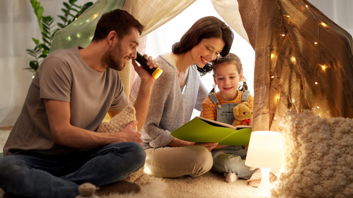 family indoor tent reading